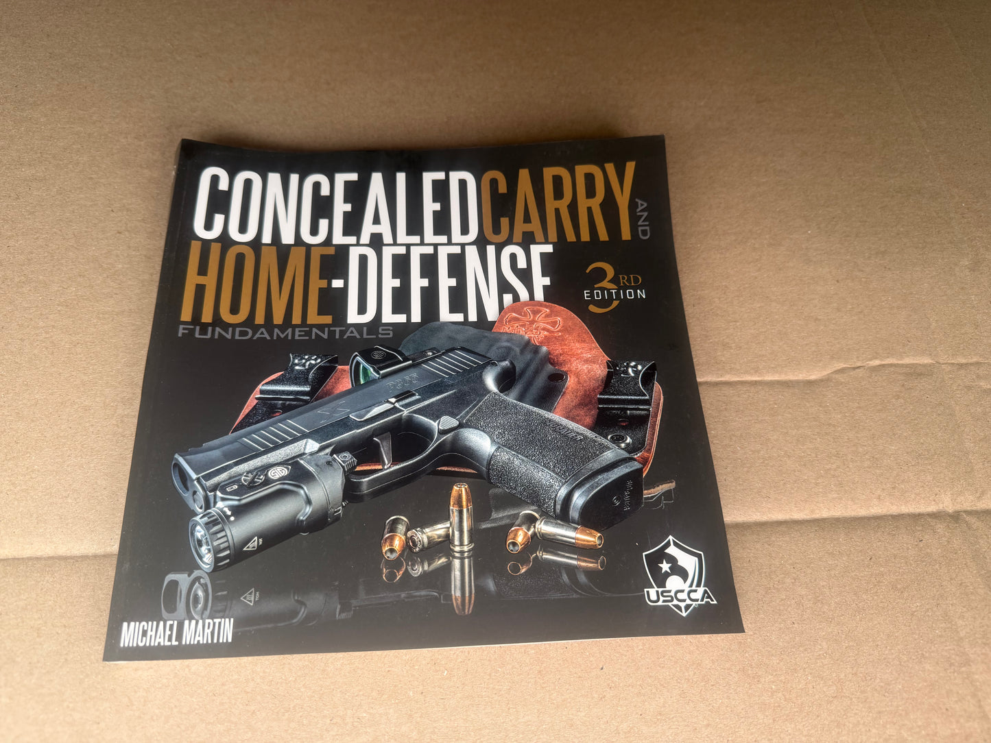 USCCA CONCEALED CARRY AND HOME DEFENSE FUNDAMENTALS BOOK